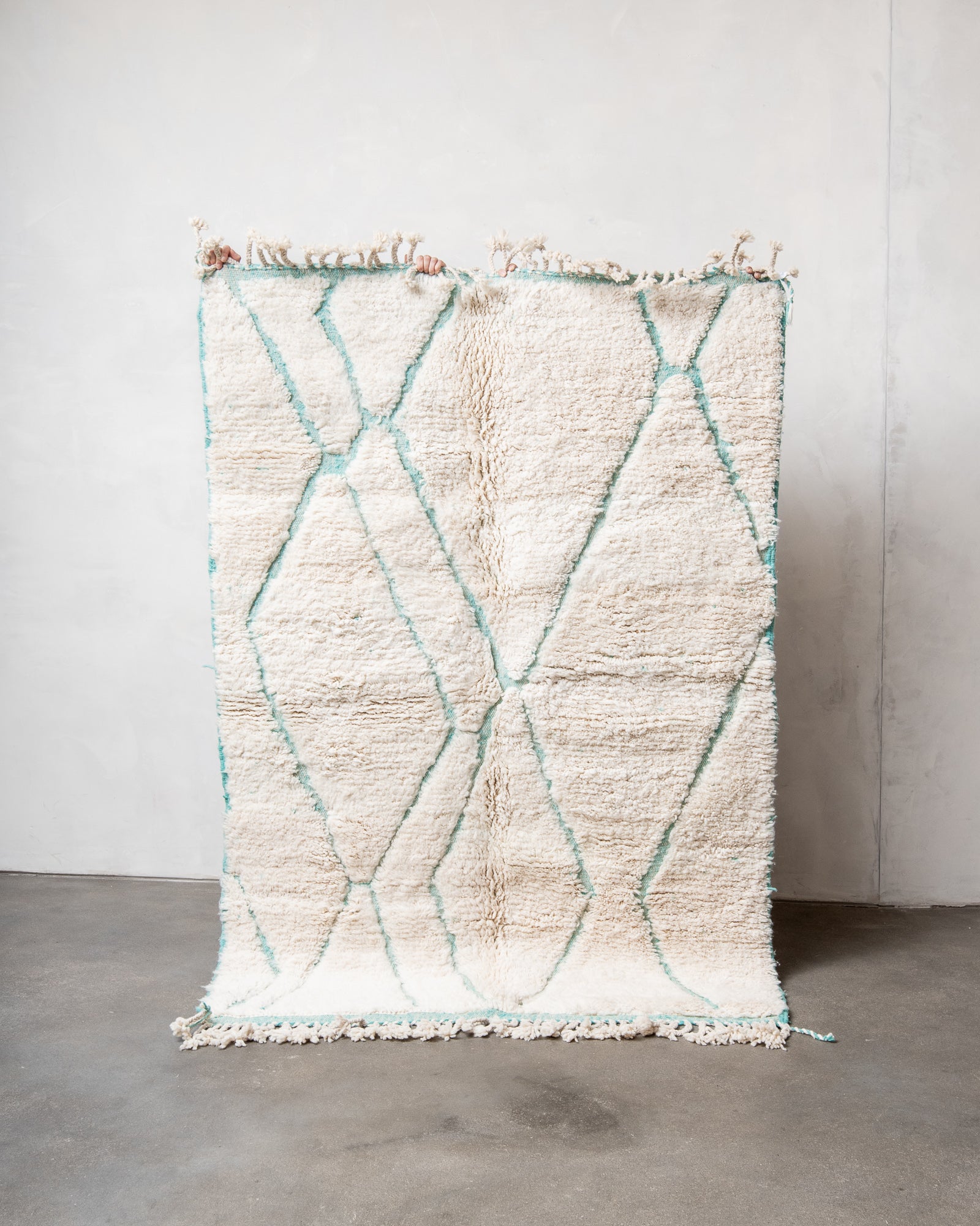Modern, designer, handcrafted Berber rug from Morocco. Beniourain carpet with beautiful colours and patterns and fluffy wool texture.